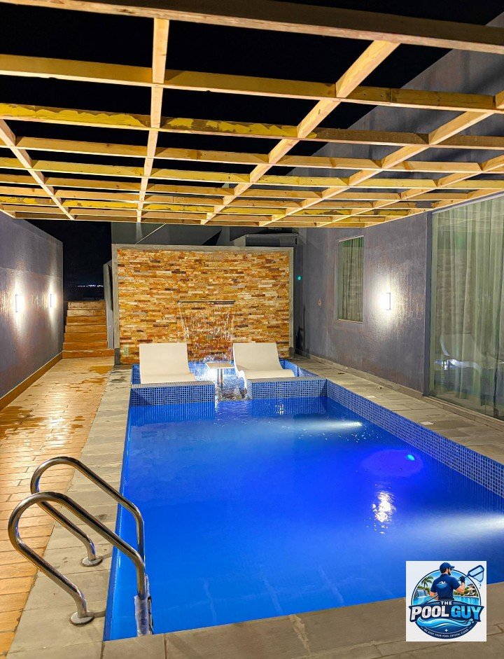 Night Pool with Waterfall Feature